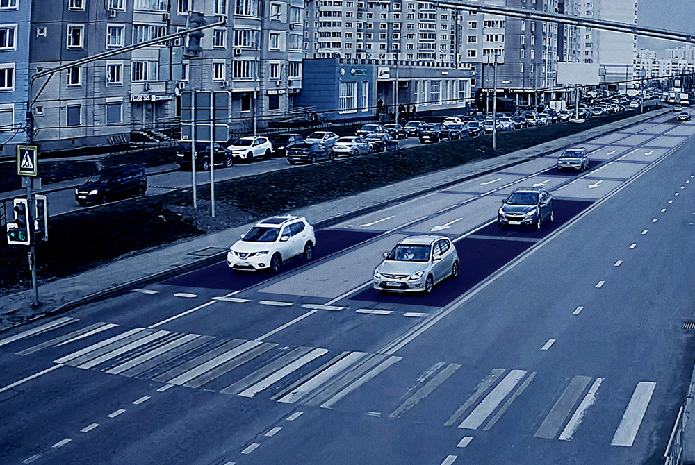 Cars at a traffic light. 