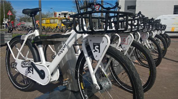 Bicicleta compartida punto a punto con destino a una estación